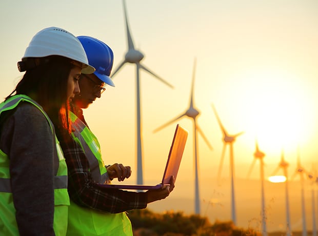 Engineers working on a wind farm